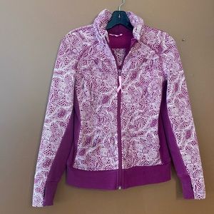 Ivivva zip up Jacket/hoodie in size 14. Super thick in pink and white.